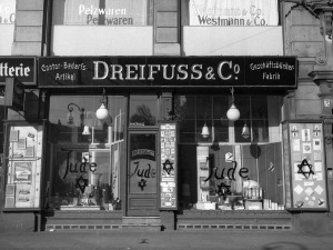 A view of a Jewish-run shop in Germany, after being vandalized by Nazis and covered with anti-Semitic graffiti, on Nov. 10, 1938.